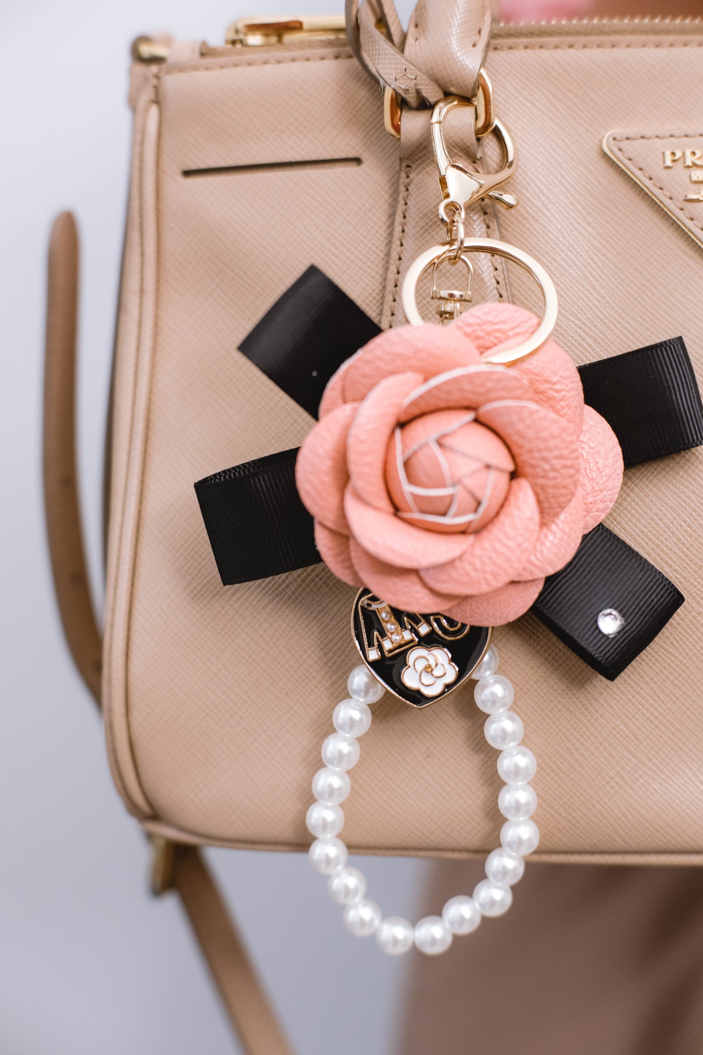 Elegant Pearl Ribbon and Flower Keychain